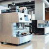 Silver Jura coffee machine model ENA 8 in office setting for coffee machine rental