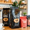 Nescafe instant coffee machine India with Nescafe Classic and Blend 43 coffee bags in black and red packaging for office use