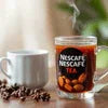 Nescafe coffee jar with white cup and coffee beans on wooden table, coffee machine grugram setting