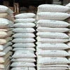 Stacks of white bags of Amazon Plus tea powder distributor Delhi for bulk vending and office use