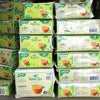Amazon Plus tea premix wholesale rates Delhi shown with packaged green and yellow boxes stacked for office and vending use