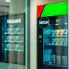 Nescafe coffee vending machine India black and green model for office use