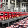 Nescafe coffee premix products in red packaging arranged in a factory for vending and office use by nescafe coffee premix suppliers in india
