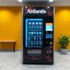 Atlantis coffee vending machine for offices black model with blue light display and product selection panel