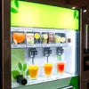 Atlantis tea coffee machine supplier India green vending machine with multiple beverage options in office setting