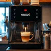 Nescafe coffee machine Udaipur black compact model brewing coffee for office use