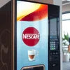 Nescafe vending machine Kanpur with digital display and coffee cup image for office use in black color