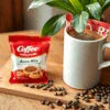 Amazon coffee premix Jodhpur red pack with coffee beans and white mug for office use
