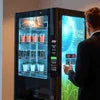 Atlantis Vending Machine Panchkula black model with drinks, used in office setting
