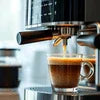 Atlantis Coffee Machine Ludhiana espresso maker brewing coffee in glass cup for office use