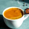 Amazon Coffee Premix Jalandhar in a white cup with rich brown crema, ideal for office or vending use