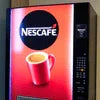 Nescafe Vending Machine Surat red and black model dispensing coffee for office use