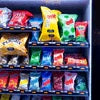 Atlantis Vending Premix Supplier MP vending machine stocked with colorful snack bags in various sizes for office use