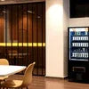 Coffee Rent Faridabad vending machine in office space with wooden walls and modern furniture