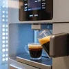 Black Amazon Coffee Vending Machine brewing espresso shot for office use