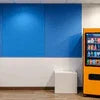 Orange Vendo Vendstar vending machine for office use offering snacks and drinks in Fridabad with vending machine rental fridabad
