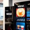 Black Nescafe Vending Machine in Delhi with digital display for coffee selection and payment