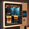 Black and silver vending machine premix in Gurgaon dispensing coffee in office setting