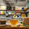Tea Coffee Premix Dealer Gurgaon branded coffee and tea cups in brown and clear glass for office use