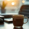 Amazon Coffee Premix Gurgaon branded brown coffee cup on office desk with blurred background