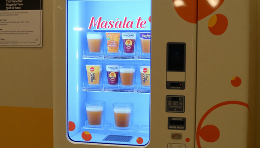 A vending machine dispensing instant masala tea