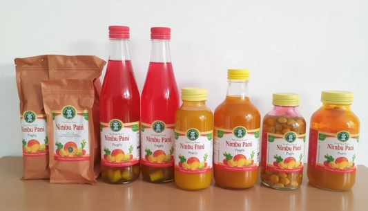 Various packaging sizes of Nimbu Pani premix bottles