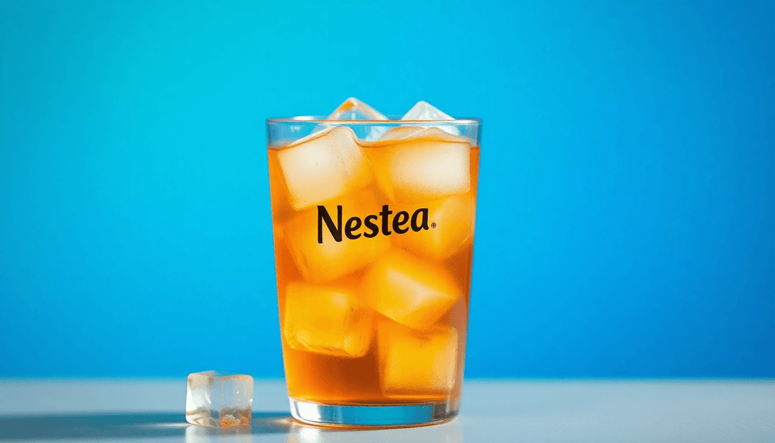 A glass of Nestea iced tea with ice cubes