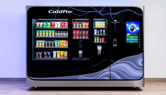Sleek Atlantis 3-lane vending machine dispensing coffee