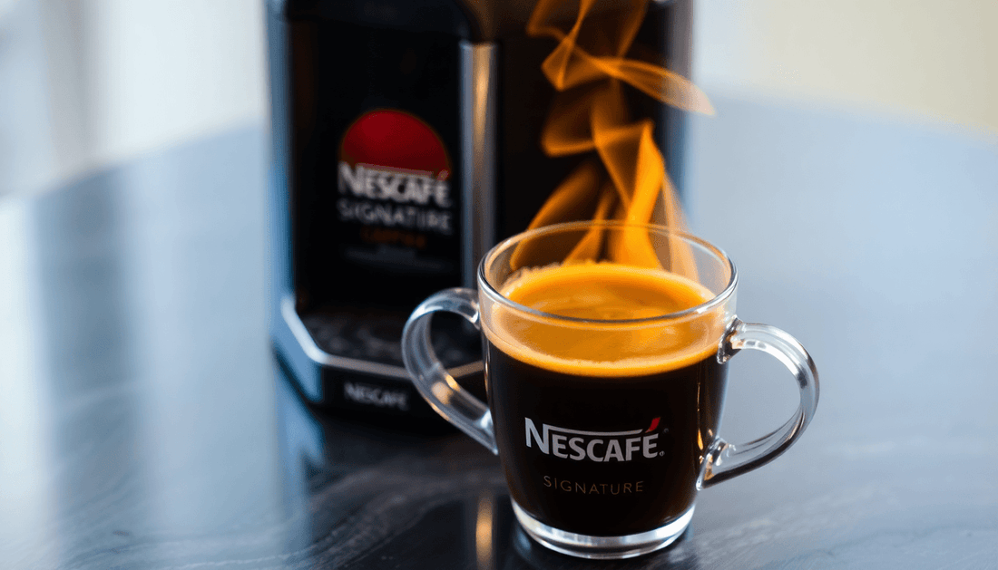 A steaming cup of Nescafe Signature coffee on a table