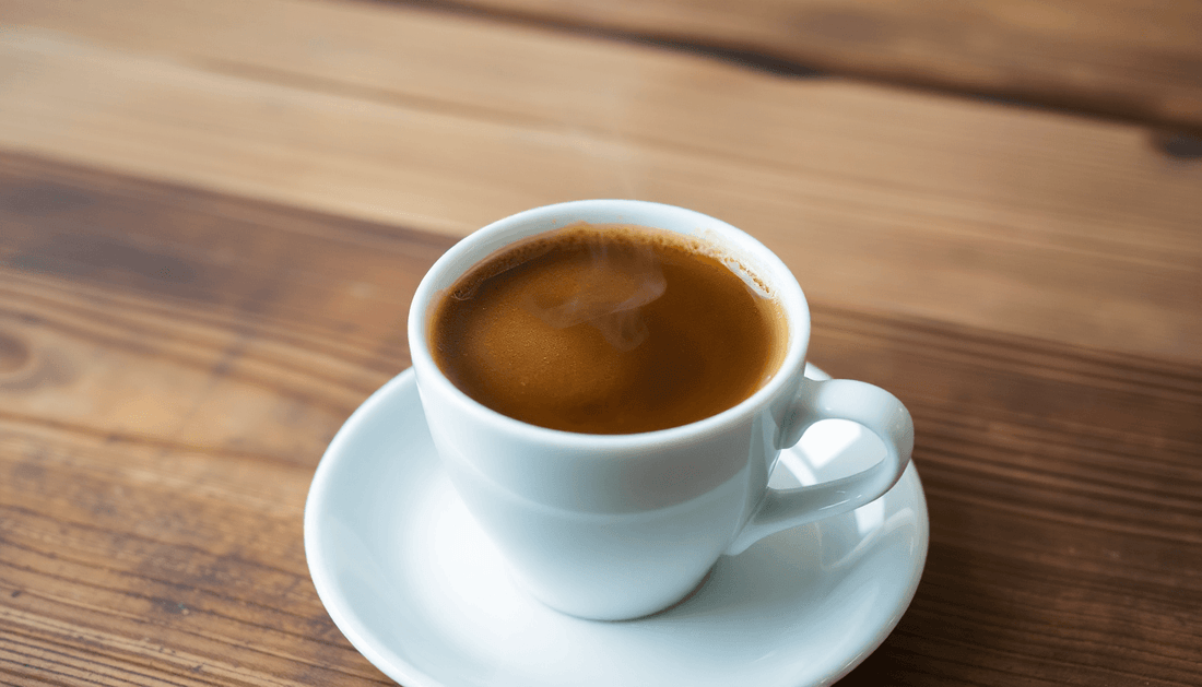 A steaming cup of rich instant coffee on a wooden table