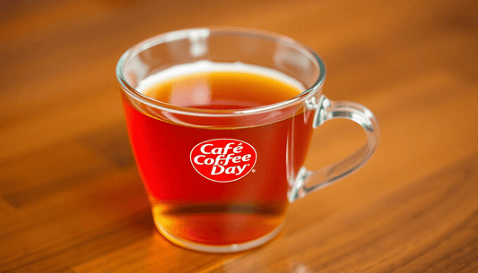 A cup of tea with Cafe Coffee Day branding