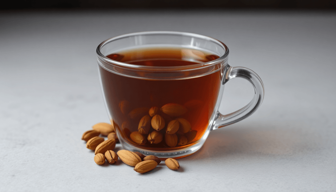 A cup of cardamom tea with cardamom pods and tea premix