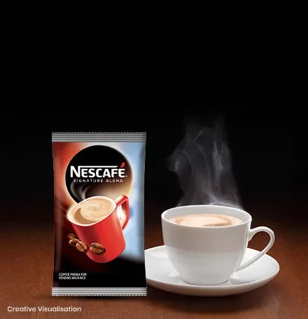 Nescafe signature blend coffee premix 1 kg pack with steaming cup of coffee for vending and office use