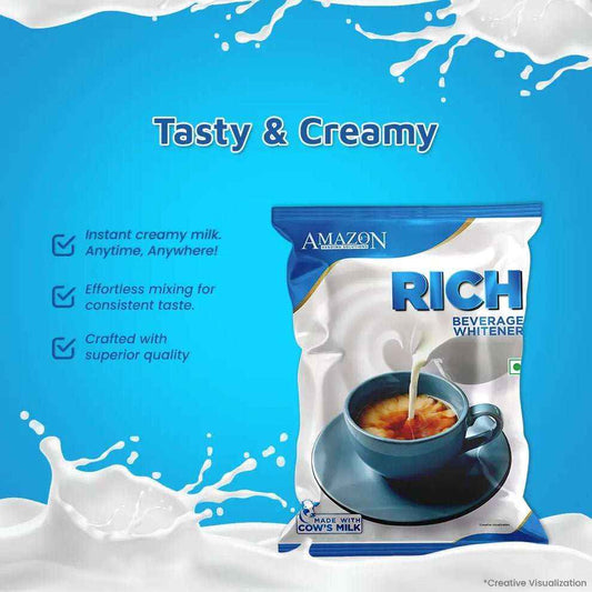 AMAZON RICH beverage whitener 500g pack with creamy milk splashes and coffee cup on blue background
