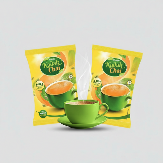 Atlantis Kadak Tea Premix 1 kg yellow packets with green cup filled with steaming tea