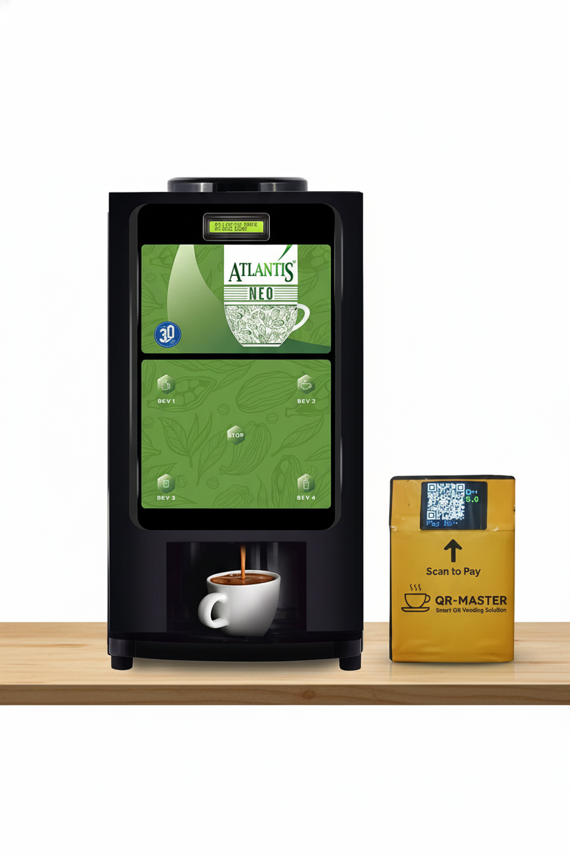 Atlantis coffee machine dispensing coffee beside QR-Master payment box with Amazon coffee machine Noida branding