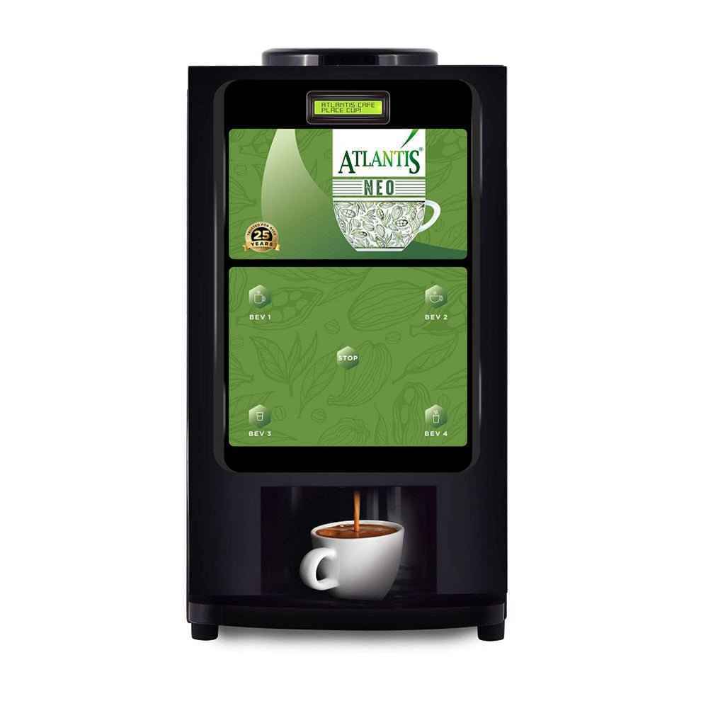 Atlantis Neo tea coffee vending machine dispensing coffee into white cup with green interface