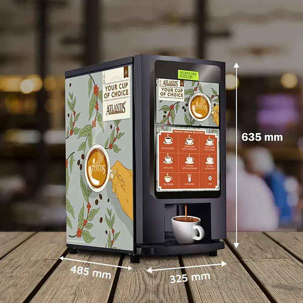 Atlantis select 7 option coffee machine with touch screen and compact design dispensing coffee into a white cup