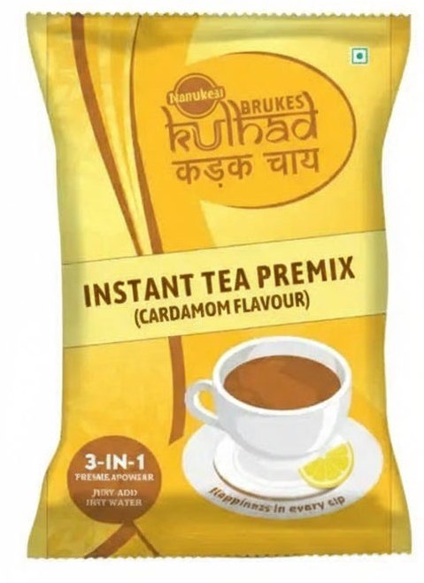 Coffee walla instant tea premix 1 kg cardamom flavour powder with tea cup and lemon slice on yellow packaging