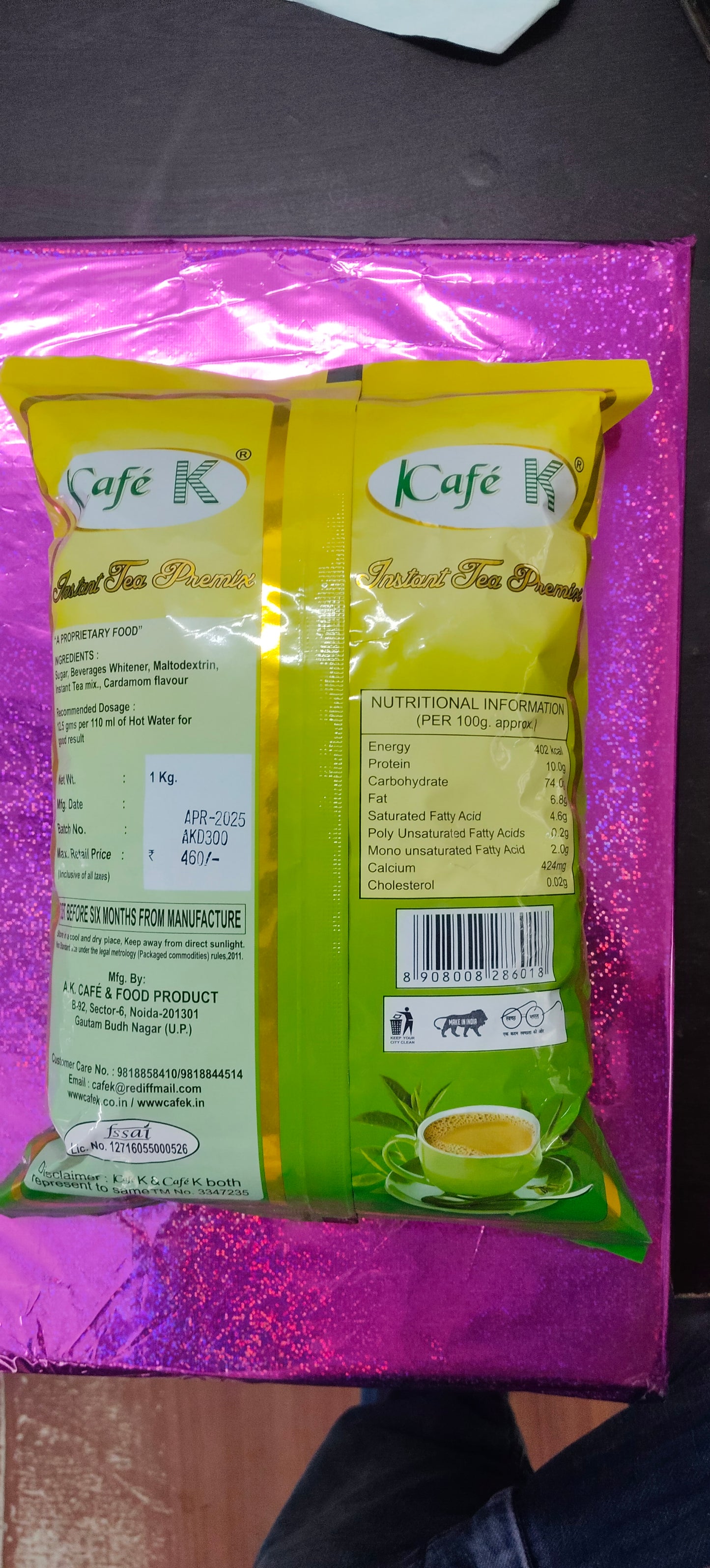 Cafek tea premix cardamom in yellow and green packaging by Coffee walla showing nutritional information and product details