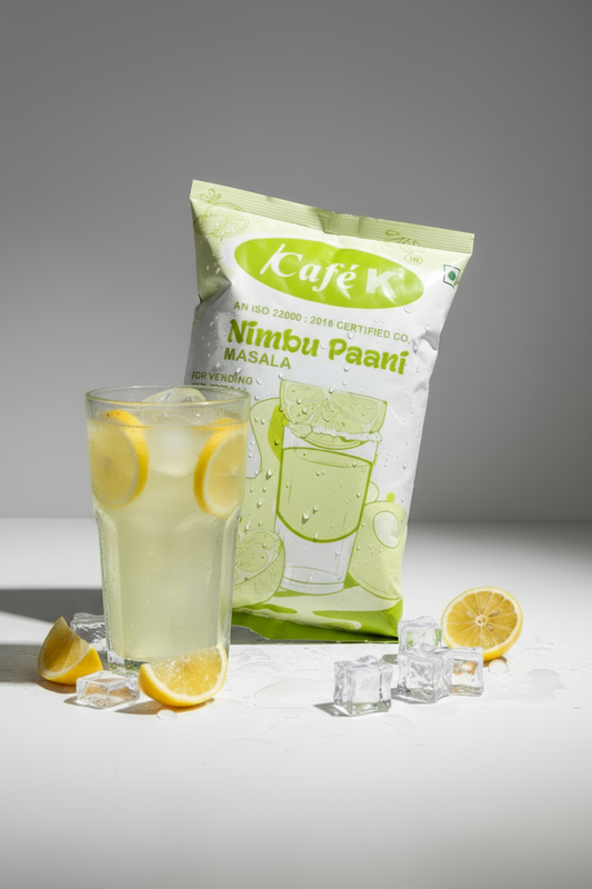 Nimbu paani premix for vending machines by Coffee walla with a glass of lemon drink and ice cubes