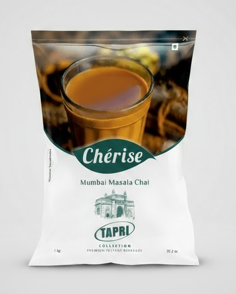 Cherise Tapri premium chai Mumbai Masala Chai pack with a glass of spiced tea from Tea coffee vending service