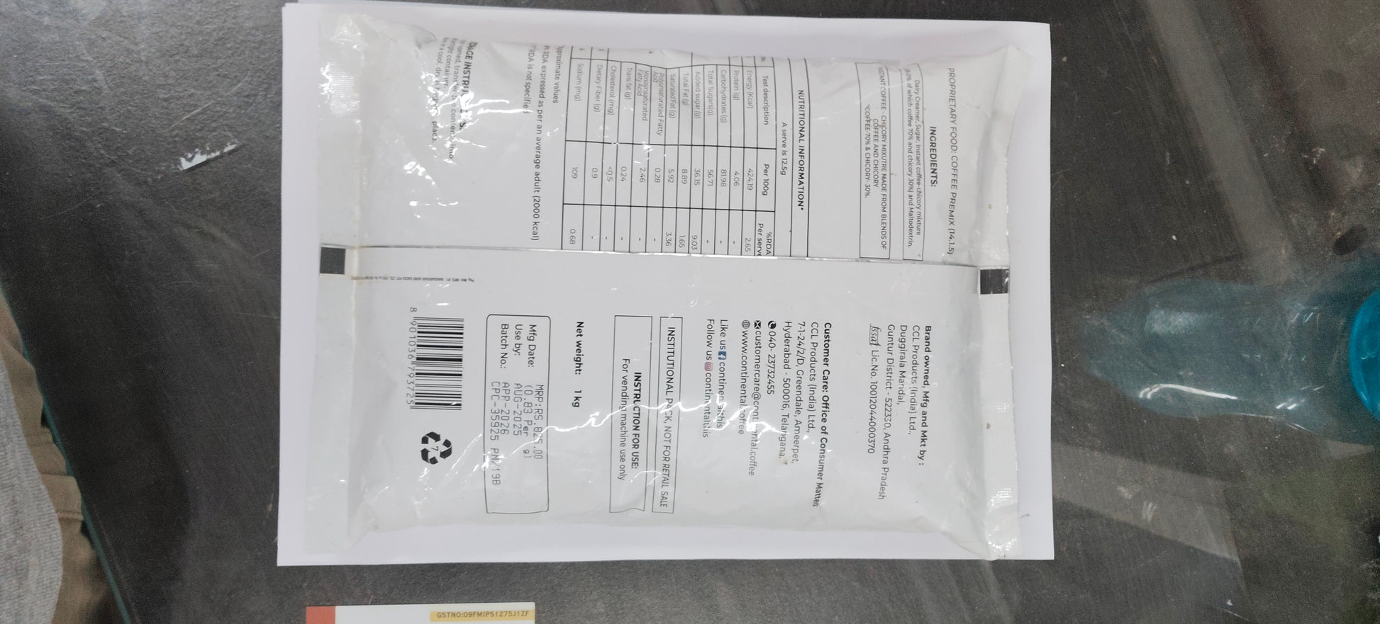 Back view of continental 3 in 1 coffee premix 1 kg white packaging with nutritional information