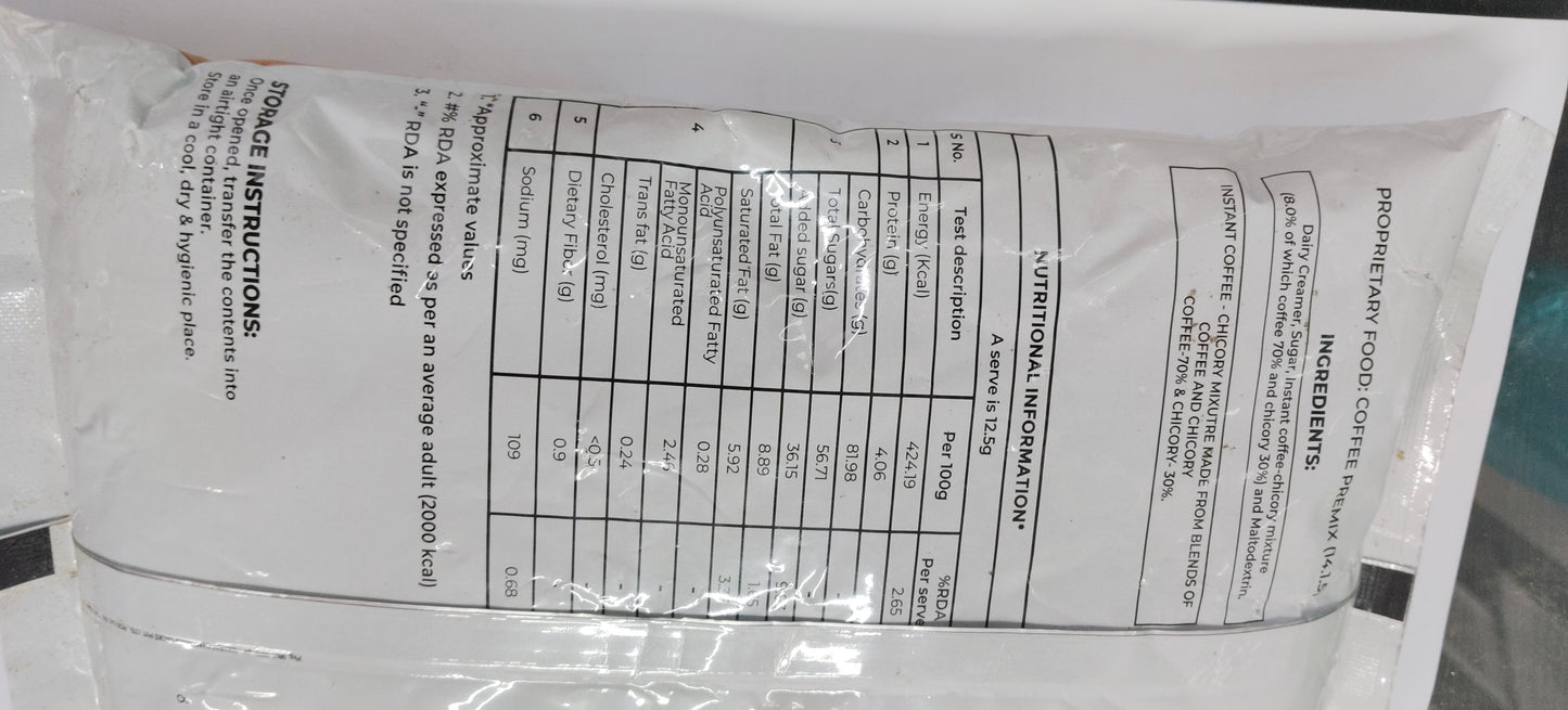 Back view of continental 3 in 1 coffee premix 1 kg packet showing nutrition and ingredient details