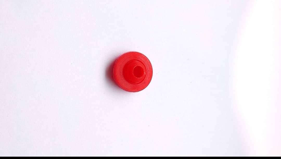 Red mixing impeller component from COFFEE WALLA on a white background