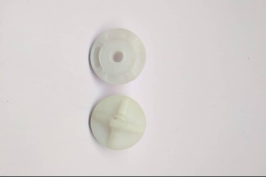 COFFEE WALLA white plastic mixing impeller parts shown from top and bottom views