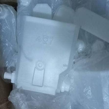 White plastic Godrej coffee machine replacement part packaged in protective plastic by COFFEE WALLA