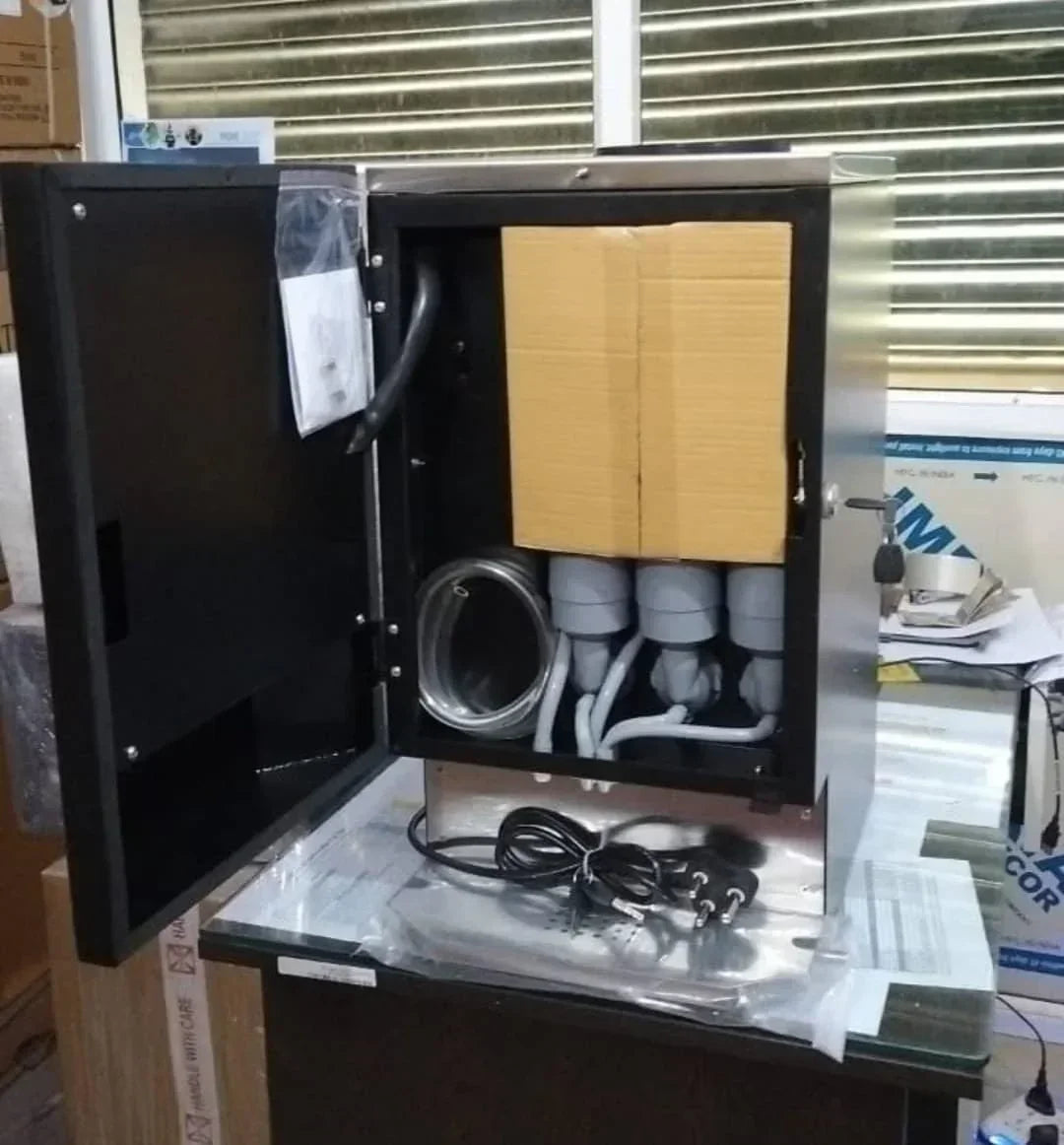 Nescafe coffee machine 3 line price online showing the inside setup with cables and connectors for tea coffee vending service