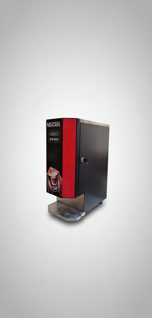 Black and red Nescafe coffee machine from Tea coffee vending service on glass table near window