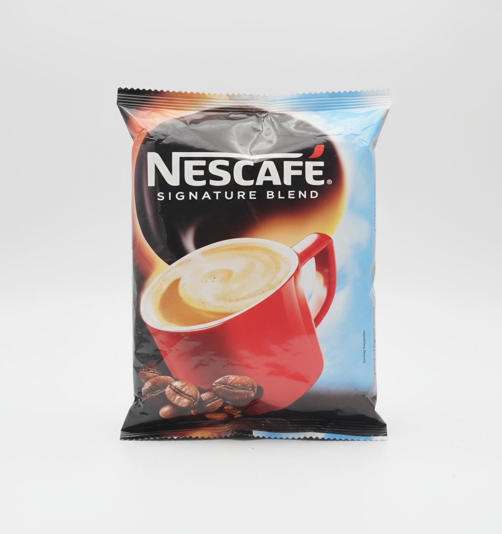 Nescafe Signature Blend 1kg premix in a packet with a red coffee cup and coffee beans